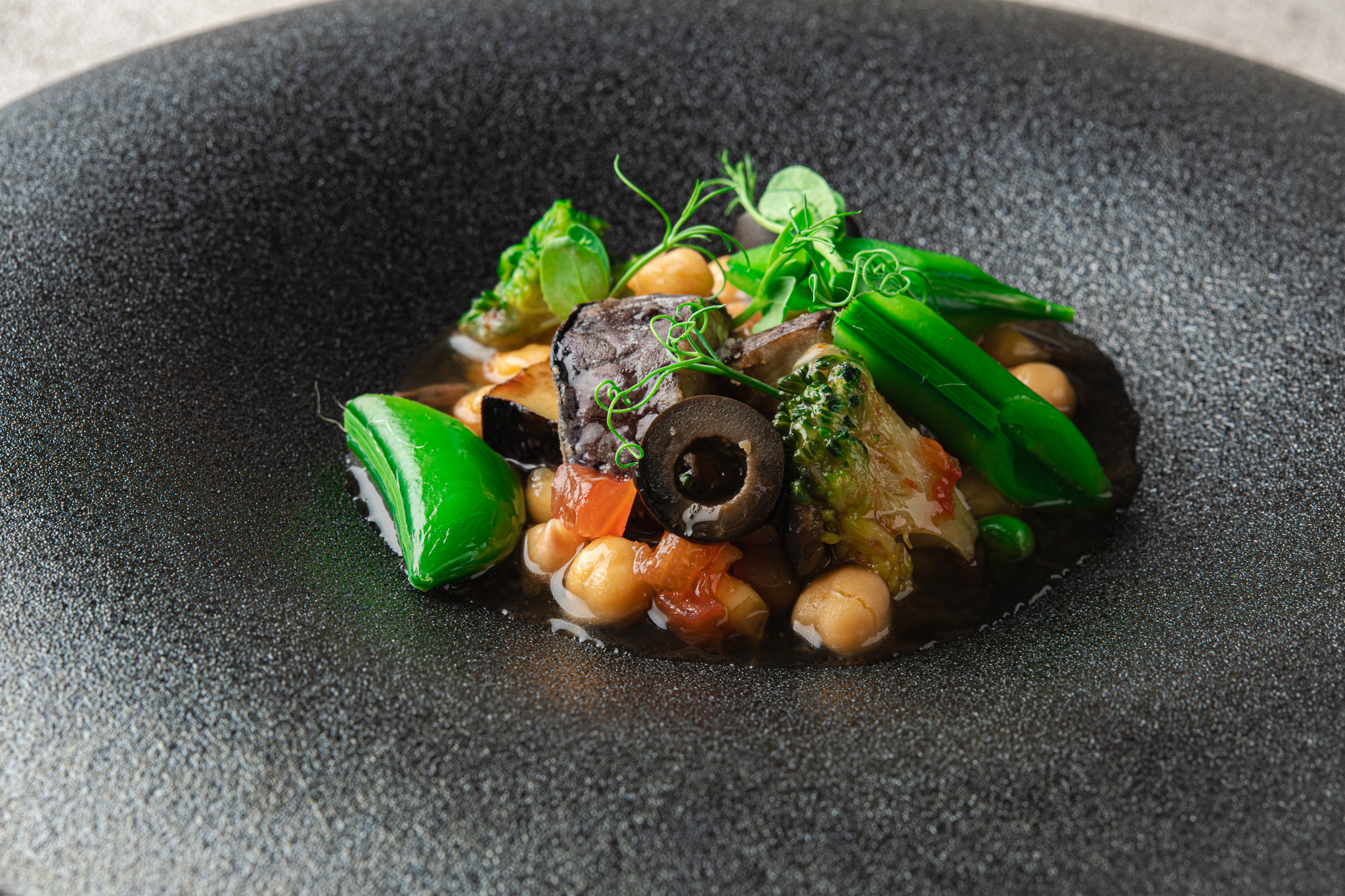 Close-up of plated seafood and salad dishes