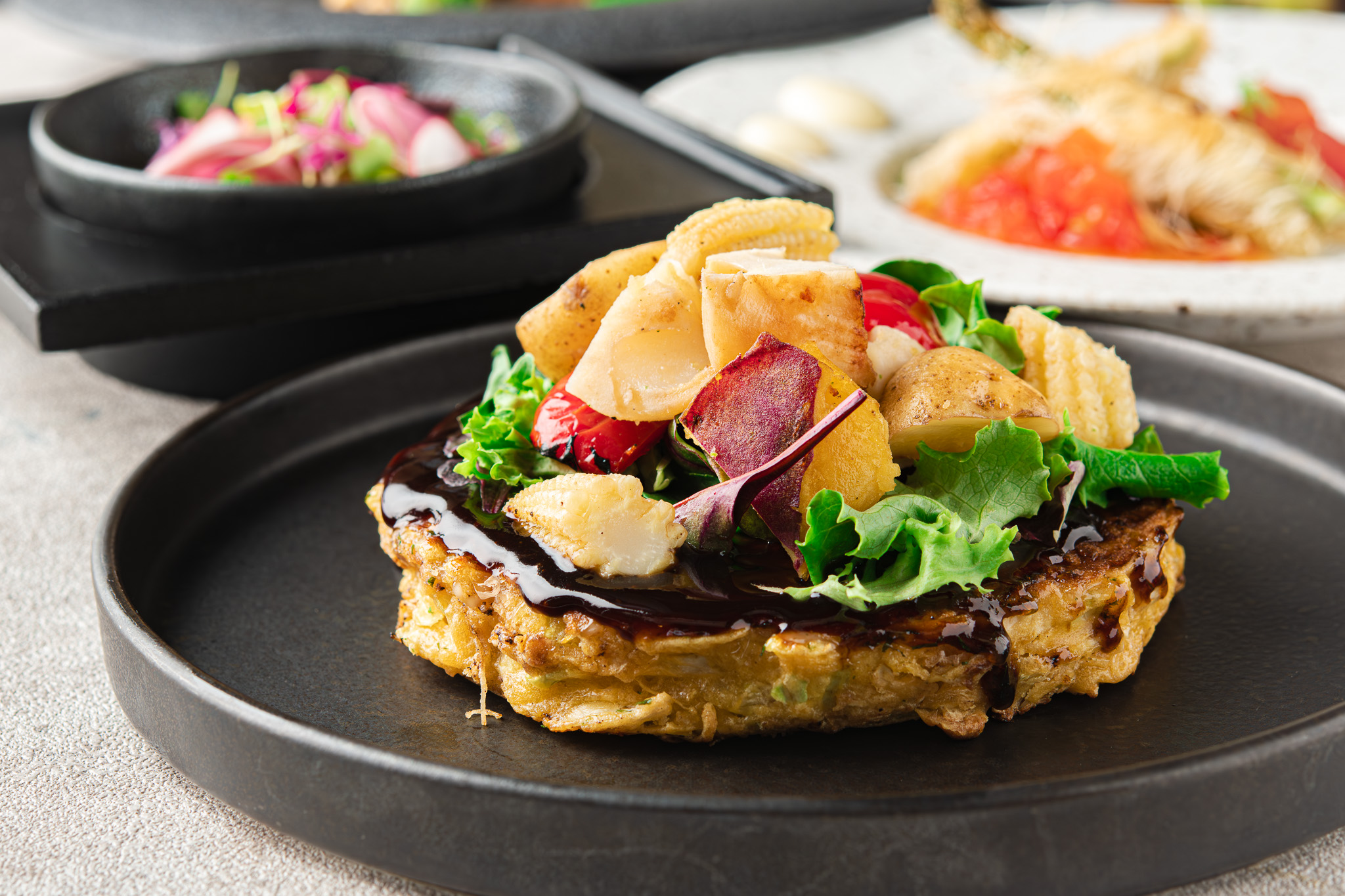 Dessert course detail on a black plate